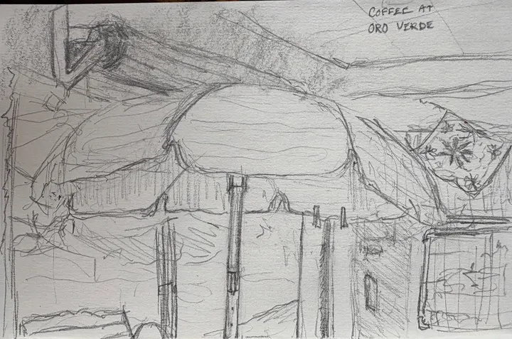 Loose pencil sketch of a terrace with a parasol and a mountain ridge beyond