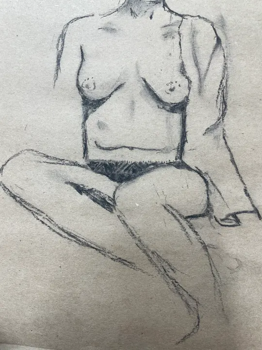 Charcoal self-portrait: a seated nude figure, cropped at the shoulders