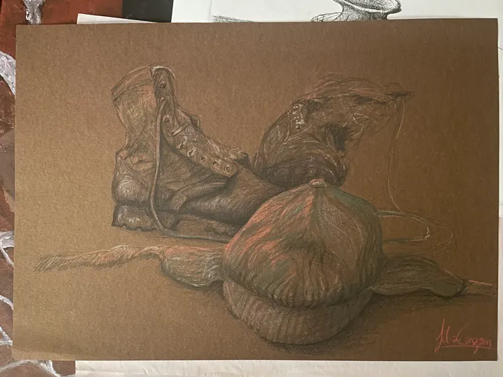 Still life of a pair of worn boots and a knitted hat, drawn in dark and white pencil on brown paper, signed in red