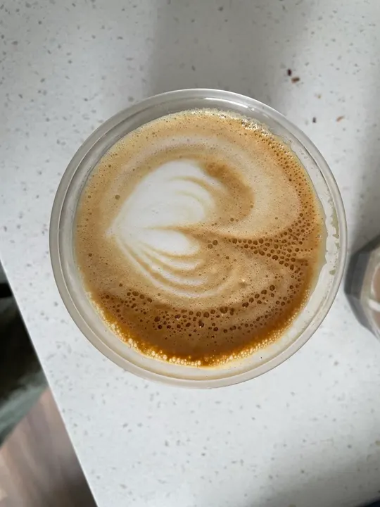 A heart pulled sideways in a glass cup