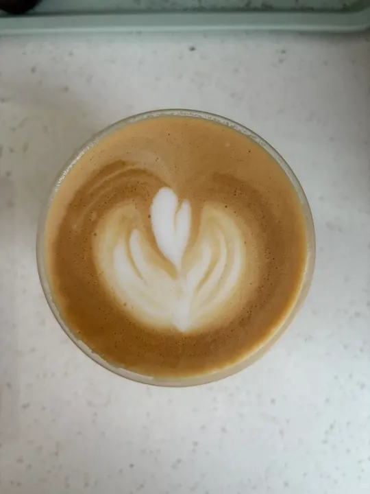 A small three-layer tulip in a glass