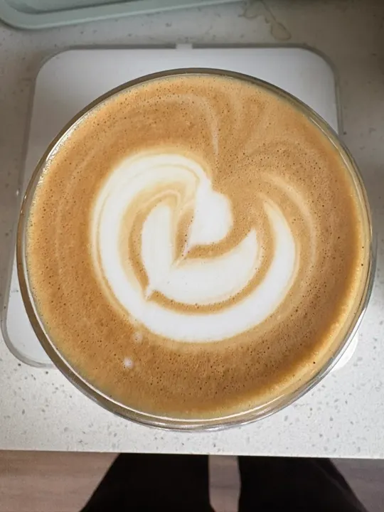 A heart curling into a swan-like loop